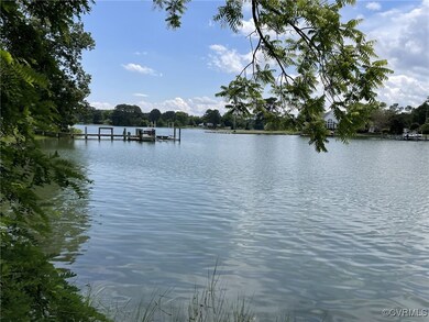 Water view featuring a dock
