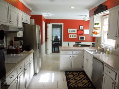 Updated kitchen solid surface countertops, new til