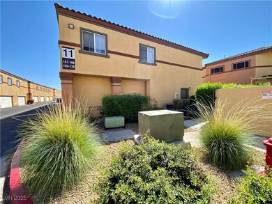 Back of house featuring stucco siding