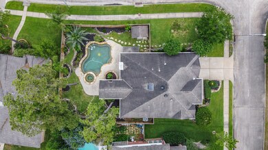 Bird's eye view of the expansive corner lot. Easily fits the pool and spa with plenty of yard space to play.