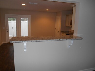 bar top located between great room & kitchen