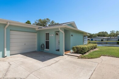 Waterfront corner villa entrance