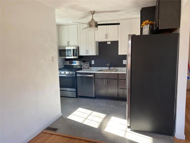 Brand new kitchen, cabinets, floors & appliances.