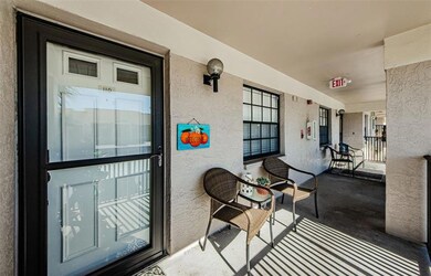 Balcony seating area with beautiful maintenance free entry door