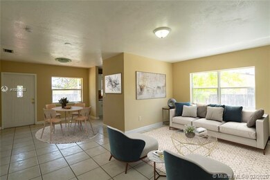 Virtually staged living room and dining area