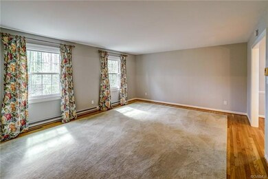 This spacious living room can be converted into a 