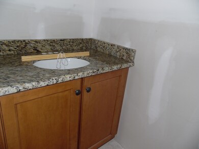 Main level half bath granite counter