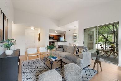 Living room featuring light wood-style flooring