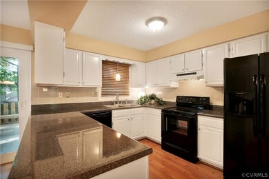 The kitchen area has almost all new appliances - r