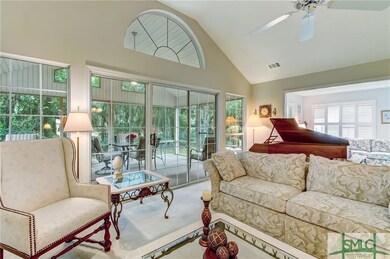 open plan out to the screened-in porch