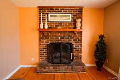 WOOD BURNING FIREPLACE WITH NICE MANTEL.