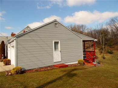 Side entrance into over size garage.