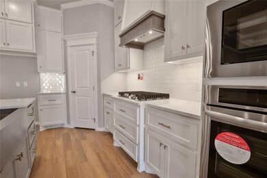Kitchen featuring appliances with stainless steel 