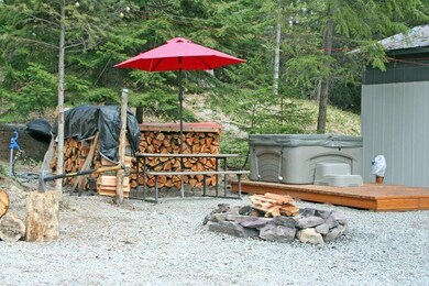 Thompson Hot tub and firepit area
