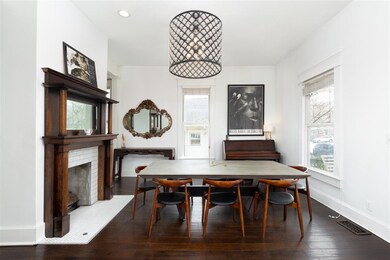 Walking in you are welcomed with this open concept dinning room and living area.