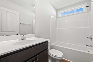 Full bathroom featuring vanity, shower / bathtub c