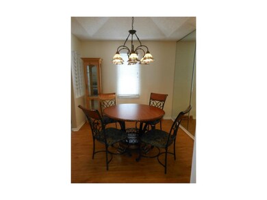 Dining room with vaulted ceilings