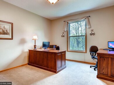Office with French doors and grand backyard view.