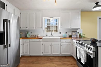 Updated with raw edge butcherblock countertops, do