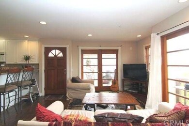 Large great room space with beautiful wood french 