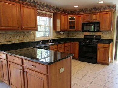 Kitchen. Custom glass/ceramic tile backsplash, gra