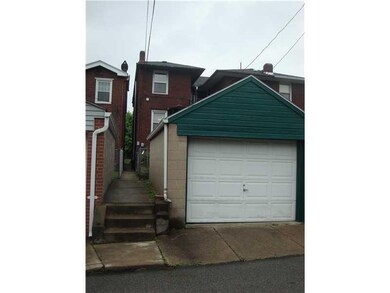 Exterior Back. DETATCHED GARAGE AND BACK OF HOUSE.