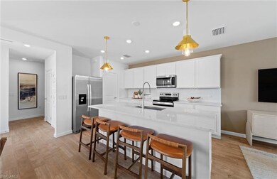 Interior photos are of a staged model home. Illust