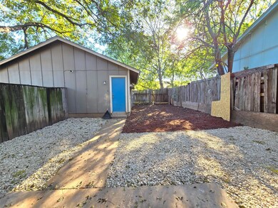 View of fenced backyard