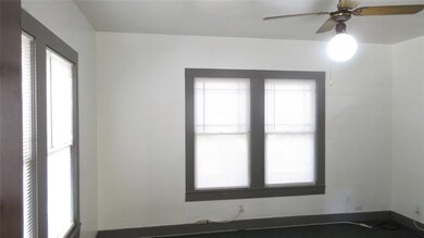 Living room featuring ceiling fan