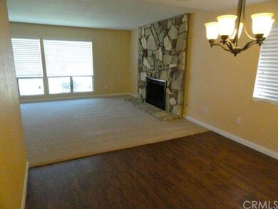 View of Living Room from Dining Room. New Flooring