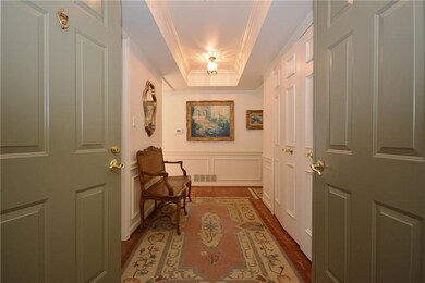 Double doors welcome you into entry hall.