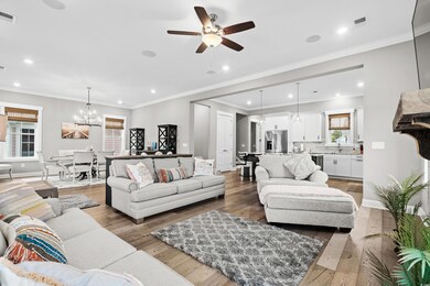 Living room with hardwood / wood-style floors, cei