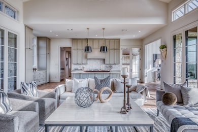The open concept connects kitchen, dining, & living in effortless flow—ideal for entertaining or relaxed weekends at home.
