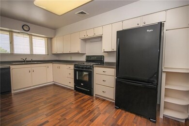 Updated appliances! New flooring.