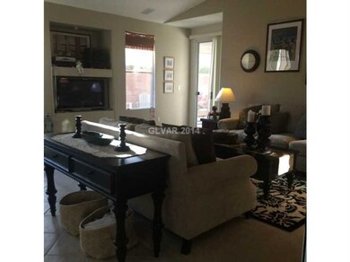 Living Room. Living room Angle facing the back doo