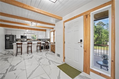 Stunning Grand Foyer with View to Kitchen