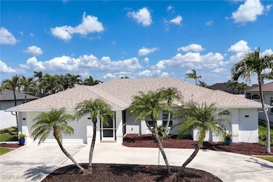 View of front of home featuring a shingled roof,