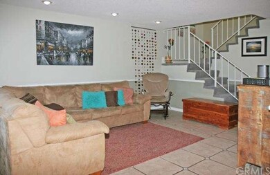 Living Room with Large-Style Designer Tile Floorin