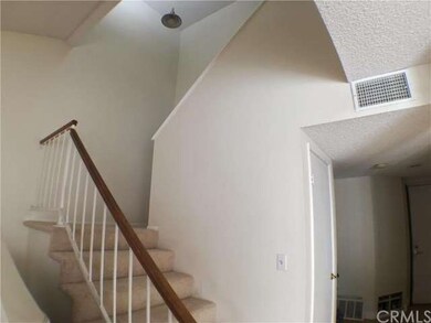 Stairs leading to second level.
