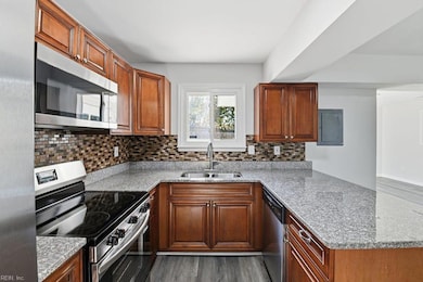 Open Kitchen with Granite Countertops & Stainless Steel Appliances