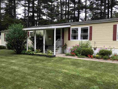 Beautifully landscaped front yard on cul de sac