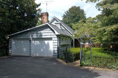Home features attached two-car garage.