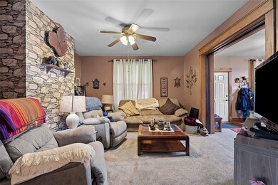 Spacious Living Room opens into Sitting Room/Entry