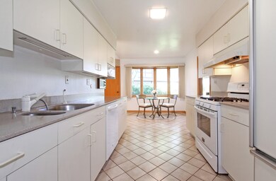 Eat-In Kitchen with Bay Window opens to the Family