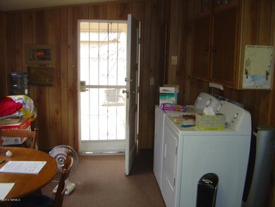 WASHER DRYER AT E END OF AZ ROOM
