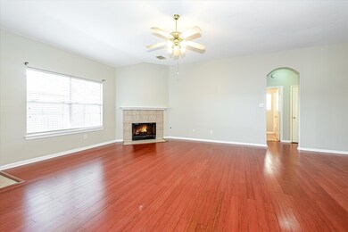 Living space features fireplace giving the space a