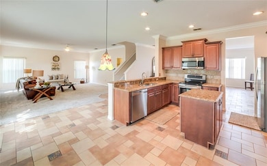 The kitchen is open to the family room which makes