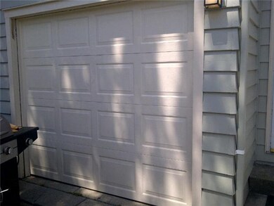 Exterior Front New garage door and opener installe