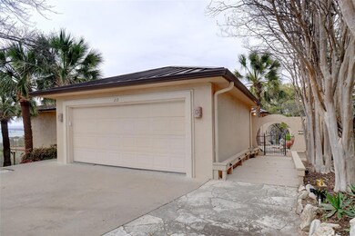 Garage featuring driveway