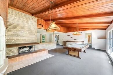 Game room with wooden ceiling, lofted ceiling with